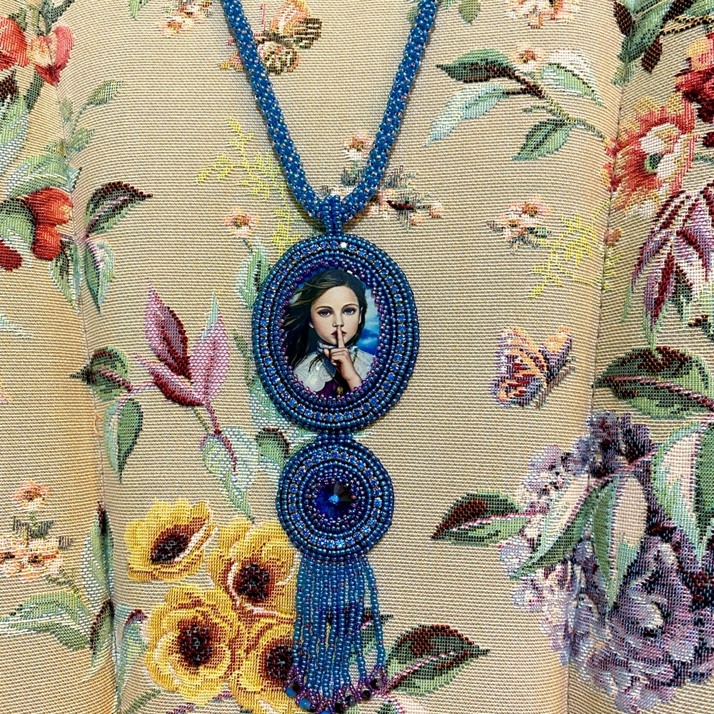 Beautiful Painted Lady hand beaded cabachon.